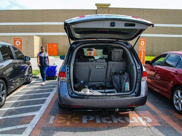 an open car trunk outside a store