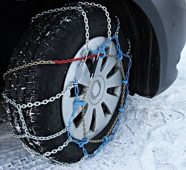 a car tire wrapped in chains